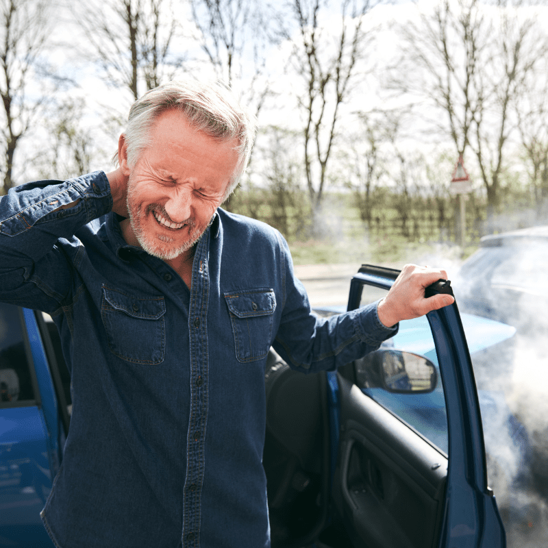 a man having a neck injury after a car accident